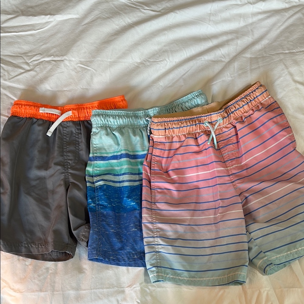 Colorful bundle of Cat & Jack swim trunks size 8